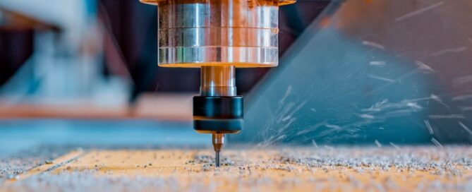 Turning and milling machine with CNC. Closeup of a spindle with a cutter during milling of the workpiece.